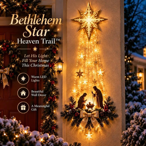 Bethlehem Star nativity wall light glowing on a front porch — cascading warm LED star lights over Mary, Joseph and baby Jesus