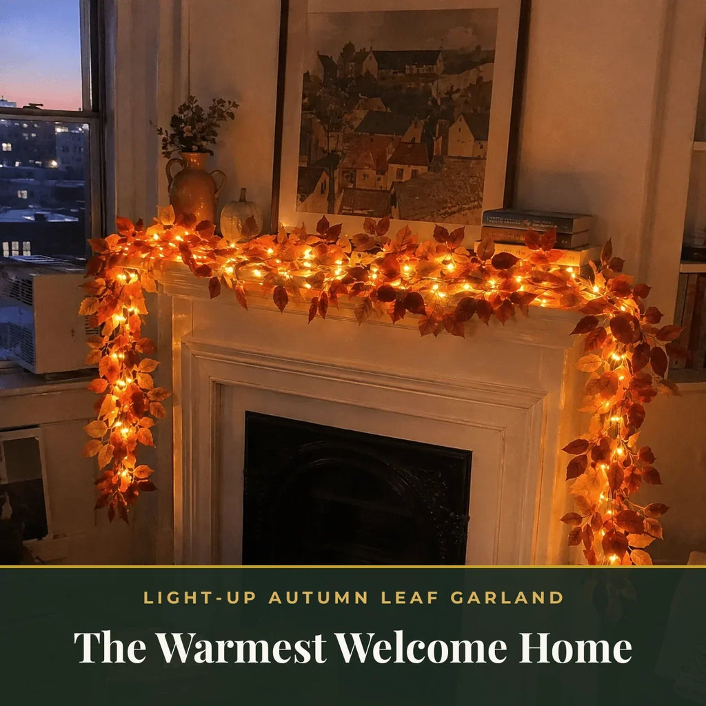 The warmest welcome home — light-up autumn leaf garland glowing over a fireplace mantel